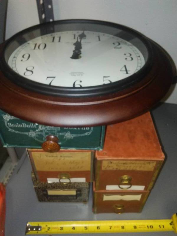 lot 248 image: Clock and vintage Office boxes.