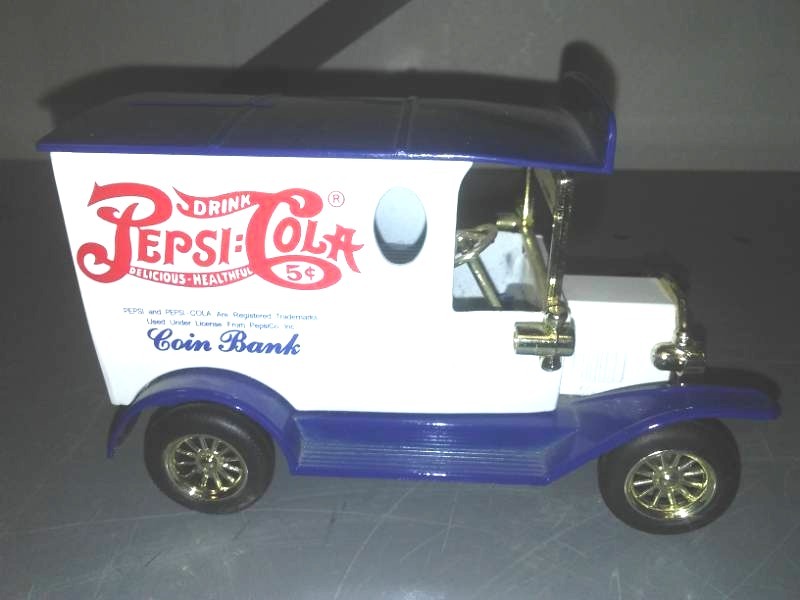 lot 277 image: Pepsi-Cola coin Bank,