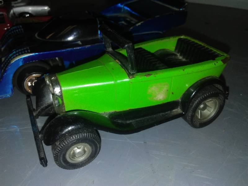 lot 334 image: 6 Vehicles, Tonka, Hallmark and more.
