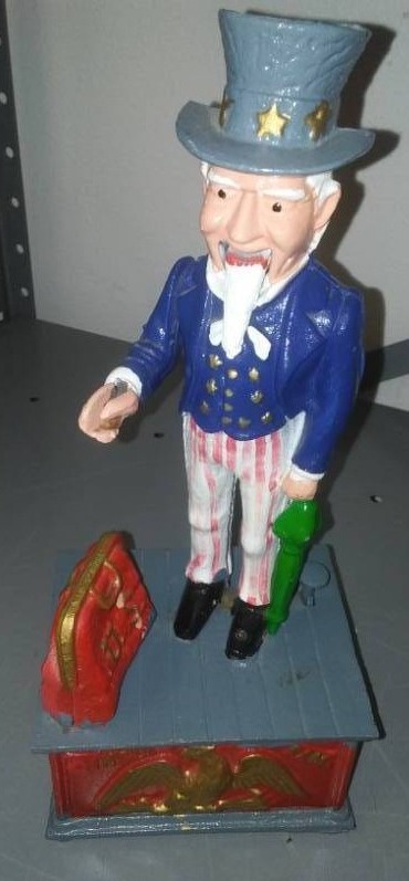lot 398 image: Uncle Sam cast iron bank