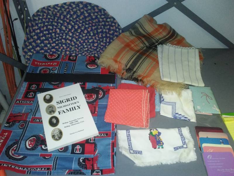 lot 418 image: Miscellaneous Sigrid Nilsdatters family book, IH bag, scarf and more.