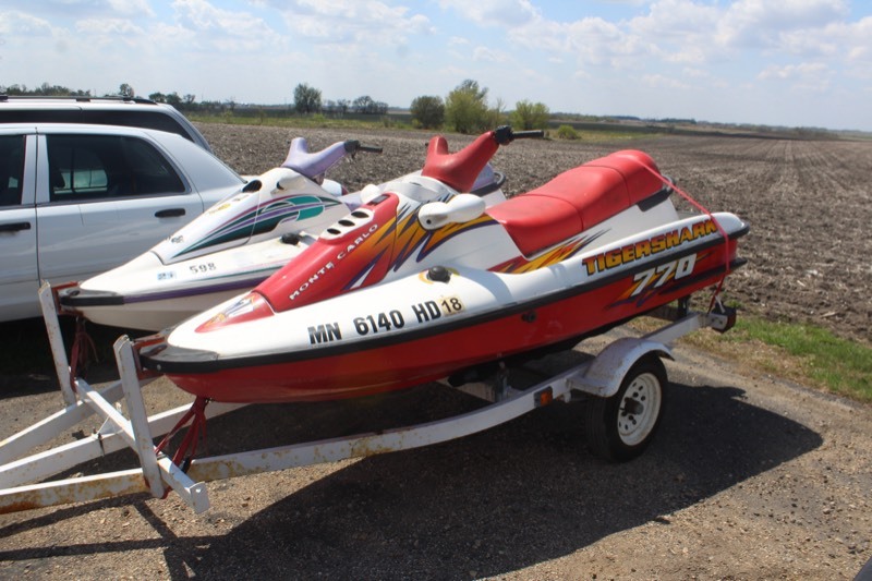 Pair of  Arctic Cat Tigershark Jet Skies w Tandem Trailer