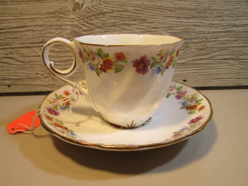 lot 4 image: Vintage Royal Stafford Cup and Sauc...