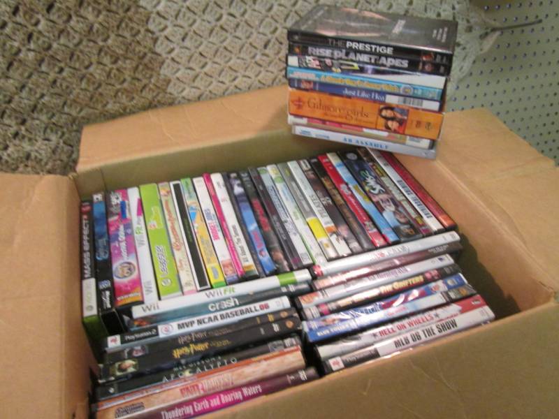 lot 87 image: Lot of 54 DVDs Some are Games  CLR...