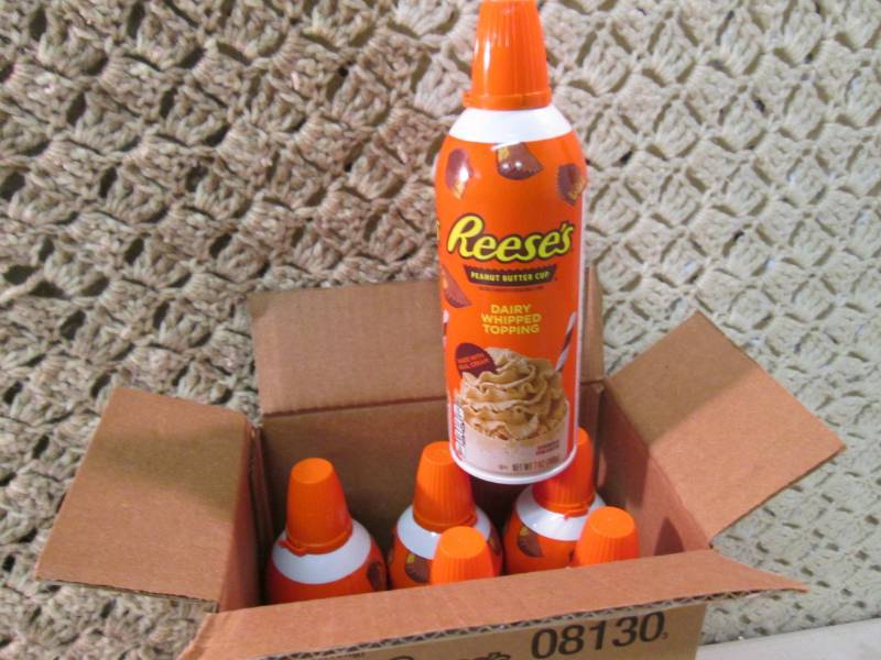 lot 176 image: Case of 6 Cans of Reeses Peanut But...