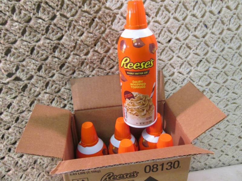 lot 177 image: Case of 6 Cans of Reeses Peanut But...
