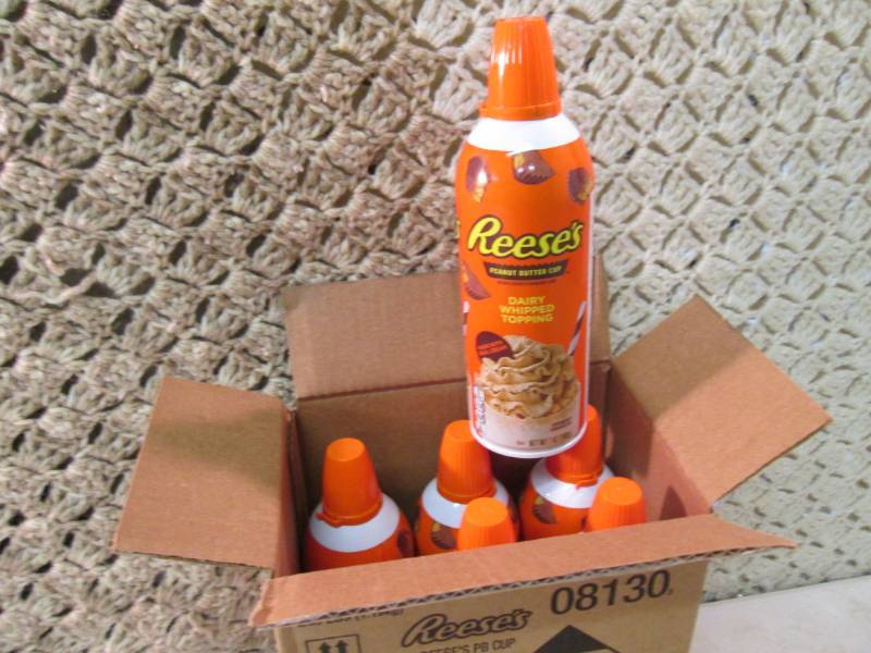 lot 179 image: Case of 6 Cans of Reeses Peanut But...