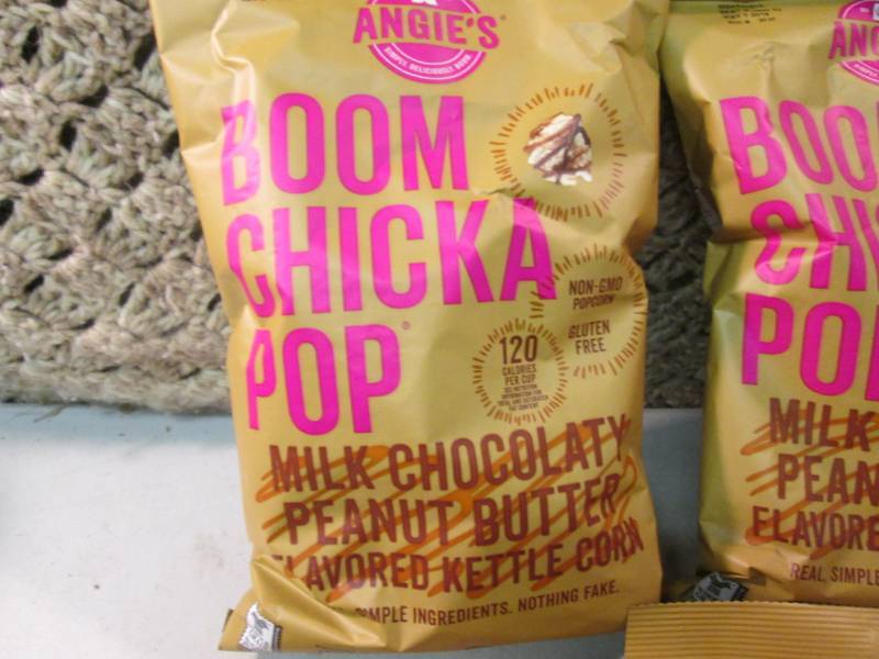 lot 222 image: 6 Bags of Boom Chicka Pop Milk Choc...