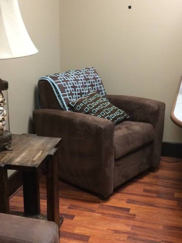 lot 50 image: MSRP $2500 Integra Seating Co The Lounge Collection Rendezvous Seating Higher Back Upholstered Arm Chair - Lifetime Warranty - Excellent Condition Includes Like New Blanket & Throw Pillow