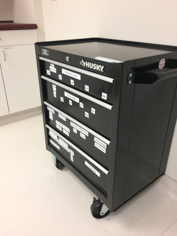 lot 56 image: Husky Heavy Duty 26 in. 4-Drawer Tool Cabinet&nbspBox Storage&nbspBlack-2633BKCA4THD - Excellent Condition - Labels Are Easily Removed - Contents Not Included