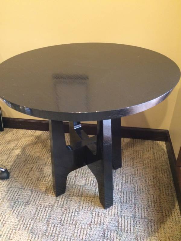 lot 91 image: Black Wood Round Bistro Table - Heavy, Edges Have Rub Marks From Paint On Wall & Excellent Condition 