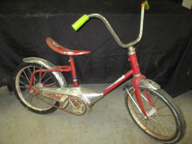 Vintage Wildcat Bike with the old Banana Seat and No Flat tires, has old hard wheels
