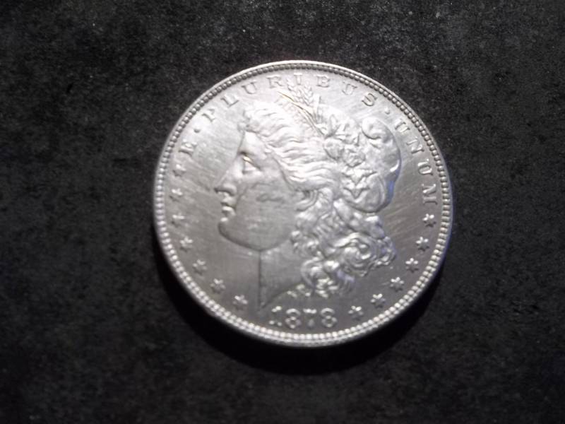 lot 3 image: 1978 7 Over 8 Tail Feathers Morgan Silver Dollar