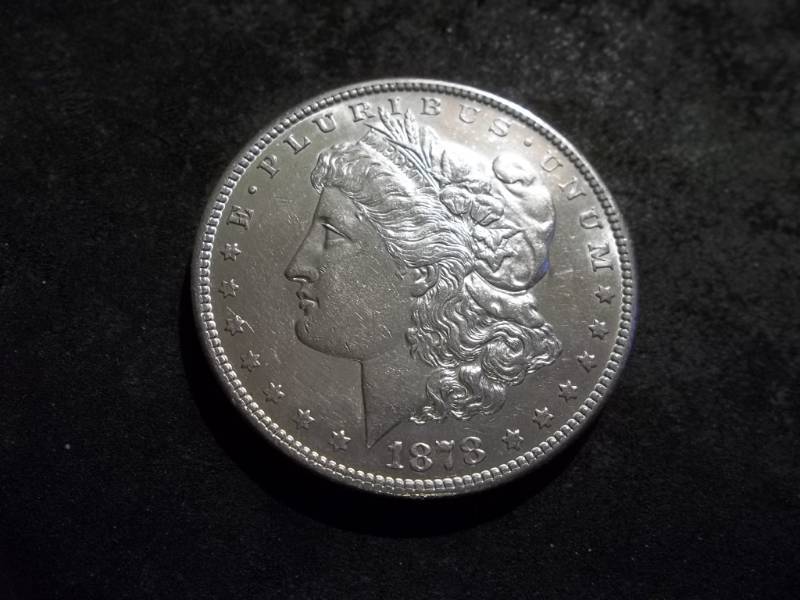 lot 6 image: 1878 S Morgan Silver Dollar