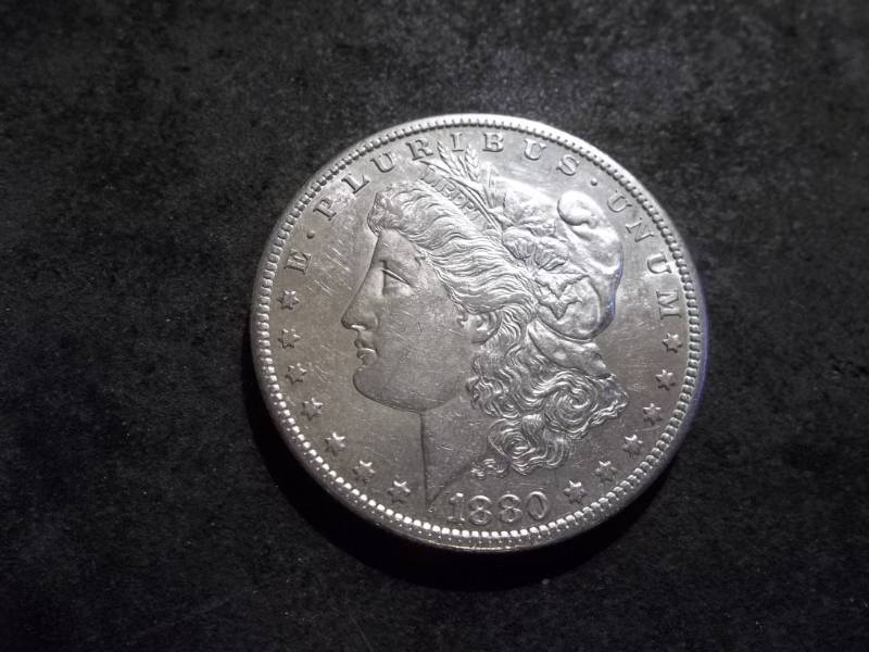 lot 10 image: 1880 S Morgan Silver Dollar
