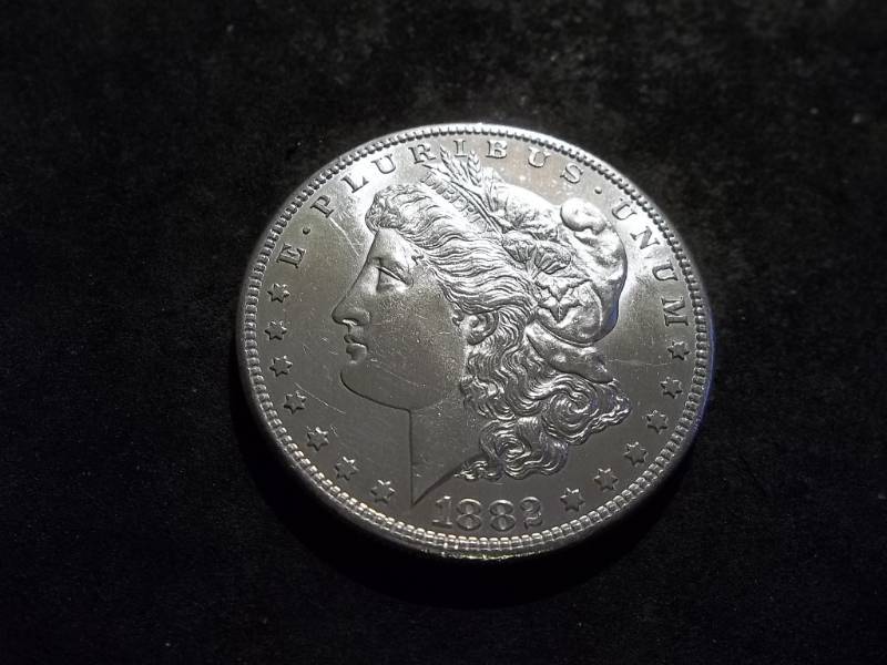 lot 14 image: 1882 S Morgan Silver Dollar