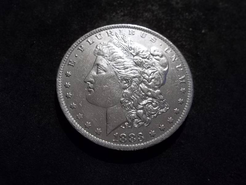 lot 16 image: 1883 O Morgan Silver Dollar