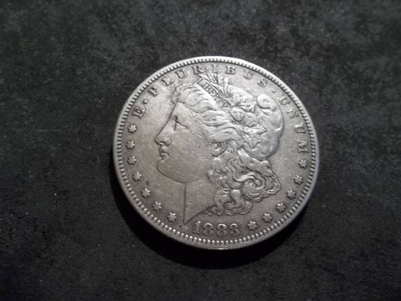 lot 17 image: 1883 S Morgan Silver Dollar