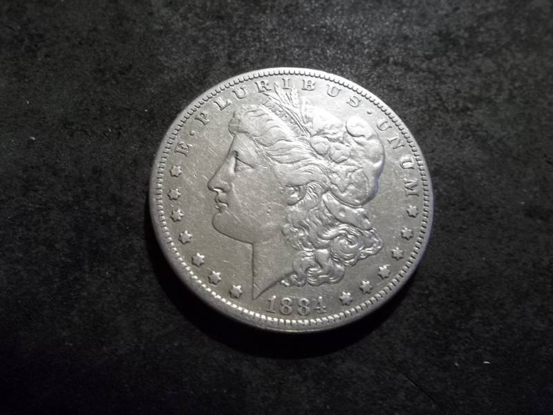 lot 23 image: 1884 S Morgan Silver Dollar