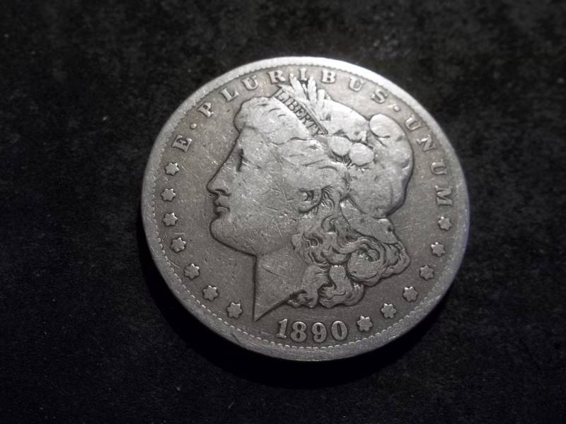 lot 32 image: 1890 CC  Morgan Silver Dollar