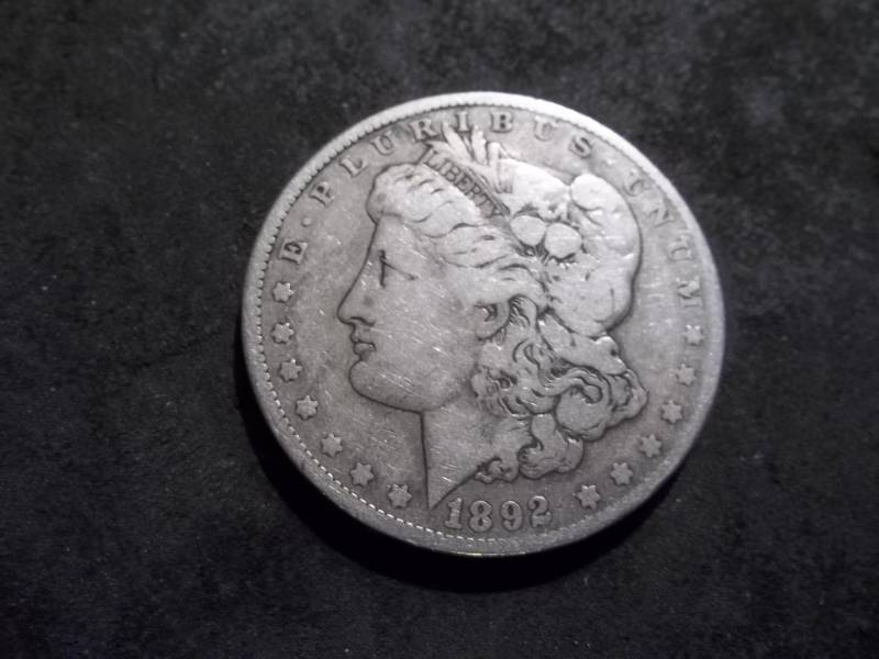 lot 35 image: 1892 O Morgan Silver Dollar