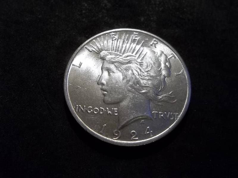 lot 52 image: 1924 Peace Silver Dollar