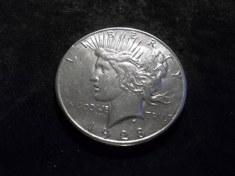 lot 56 image: 1928 S Silver Peace Dollar