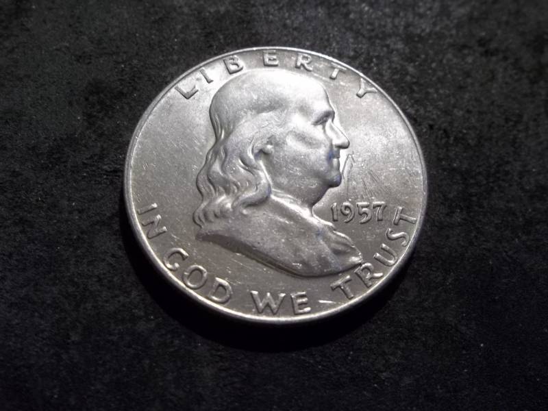 lot 102 image: 1957 D Franklin Half Dollar