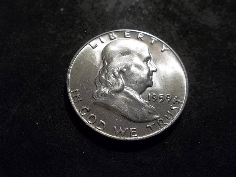 lot 106 image: 1959 D Franklin Half Dollar
