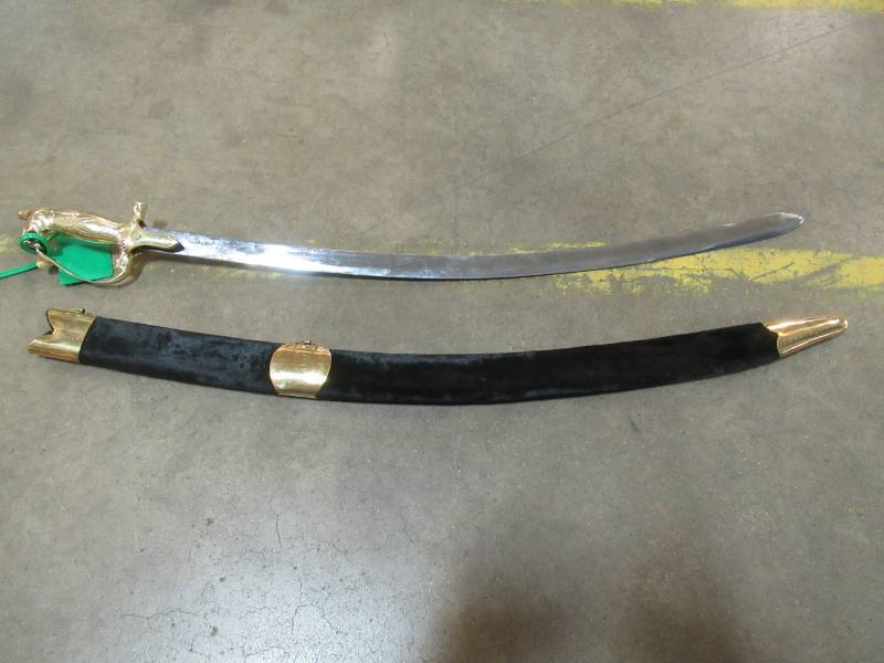 lot 153 image: Gold Colored Handled Sword with Black Velvet Case - MACHINE MADE BLADE, UNSHARPENED