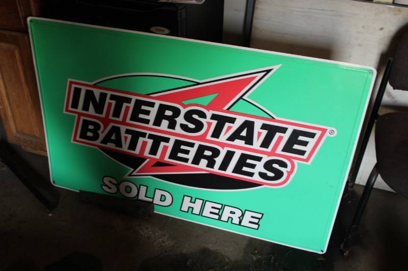 lot 188 image: Interstate Batteries Sold Here Metal Sign