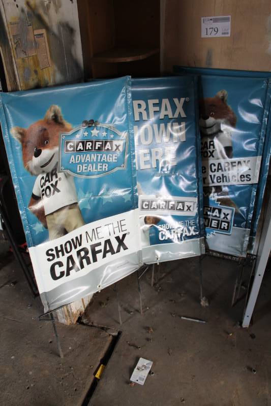 lot 179 image: Lot of (4) Show Me The Carfax Metal Sign Holders