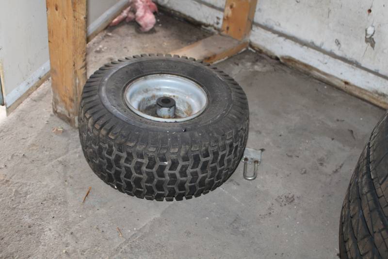 lot 24 image: Carlisle Turf Saver 15X6.00-6 Tire with 6-inch Garden Tractor Wheel