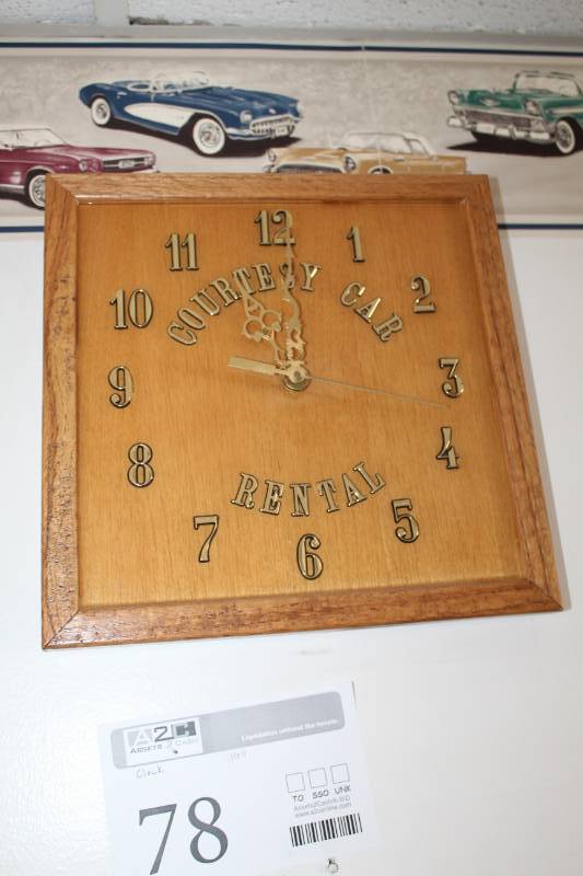 lot 78 image: Courtesy Car Rental Wood Wall Clock