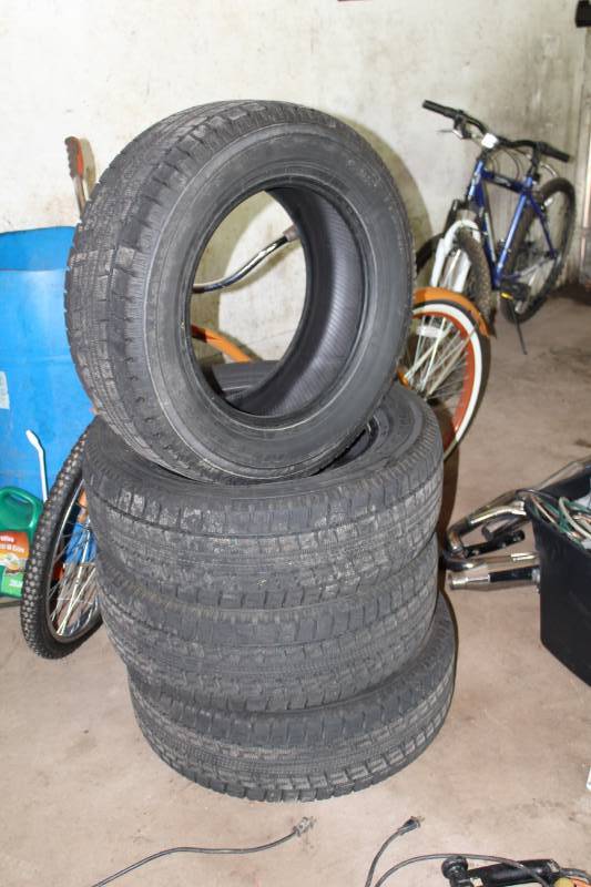 lot 355 image: Lot of (4) Nitto SN2 23565R17 Studless Tires