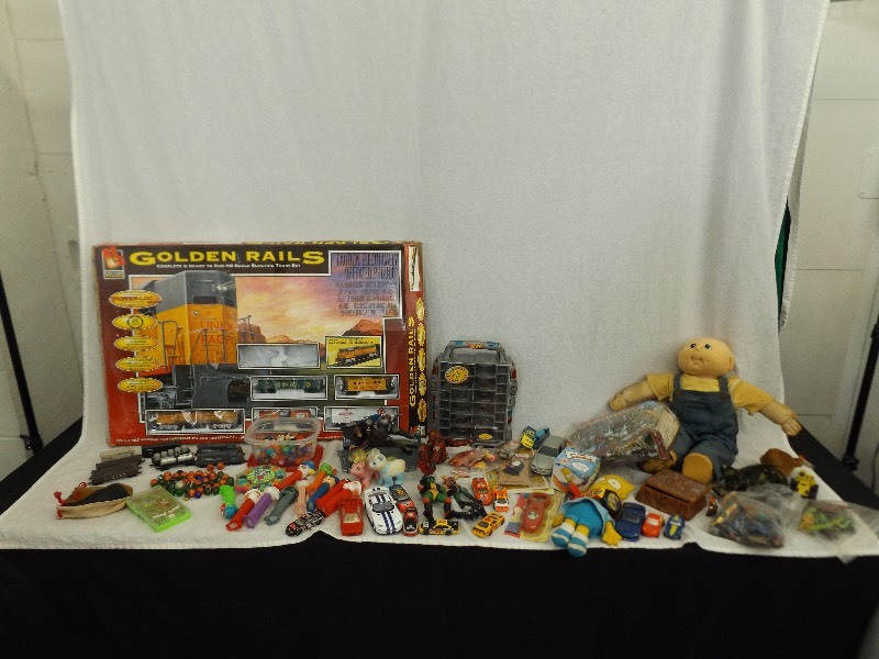 lot 21 image: Large Lot of Vintage Trains, Toys, Marbles, etc.