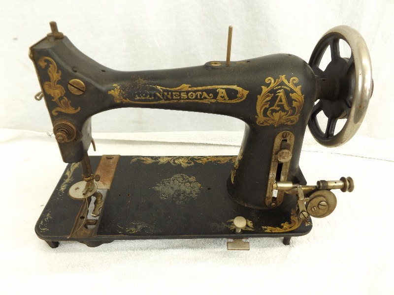 lot 129 image: Antique Minnesota Sewing Machine