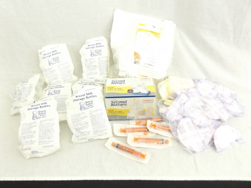 lot 145 image: New in Box Breast Feeding Supplies, Bottles, Warmer, Etc