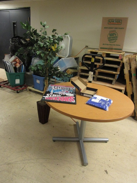 lot 333 image: MINNESOTA STATE FLAG, TABLE, ARTIFICIAL TREE, AND COMIC BOOK COVER STYLE ADVERTISMENT