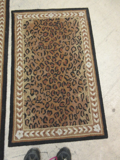 lot 352 image: THREE SAFAVIEH AREA RUGS