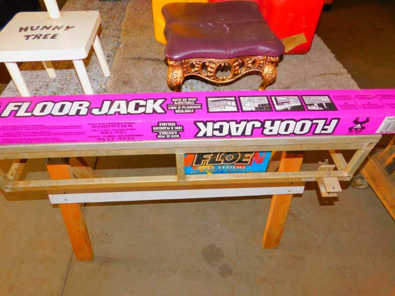 lot 59 image: NIB Adjustable Floor Jack