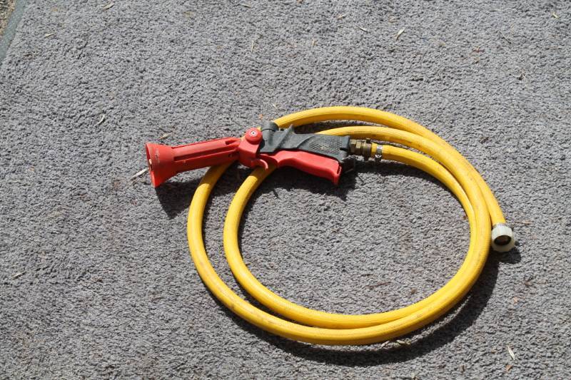 lot 62 image: Hose And Sprayer Nozzle