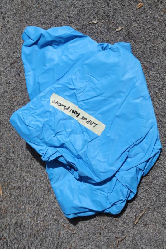 lot 99 image: Large Blue rain Poncho
