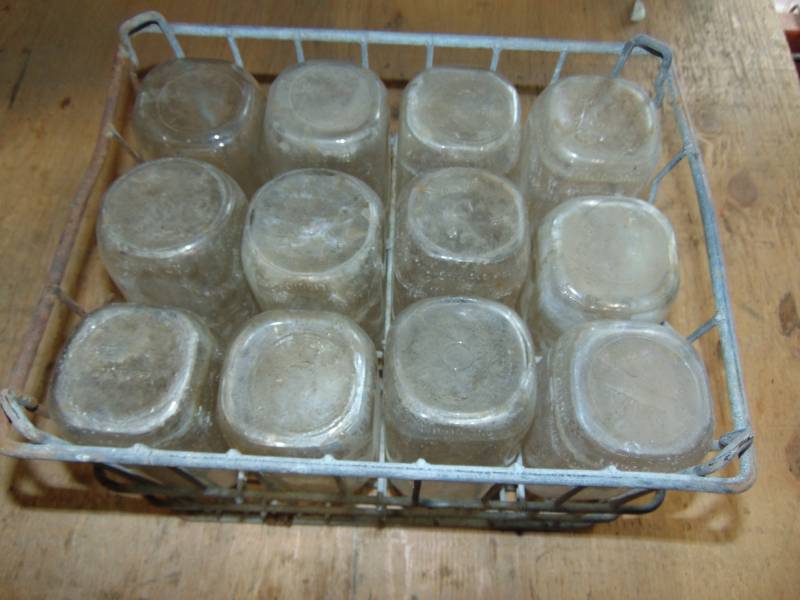lot 93 image: (12) Glass Milk Bottles With Crate