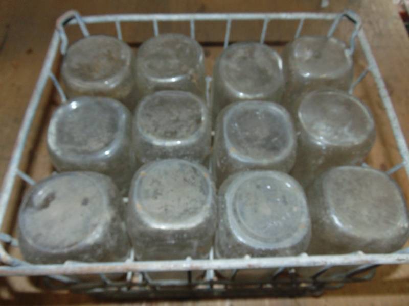 lot 94 image: (12) Glass Milk Bottles With Crate
