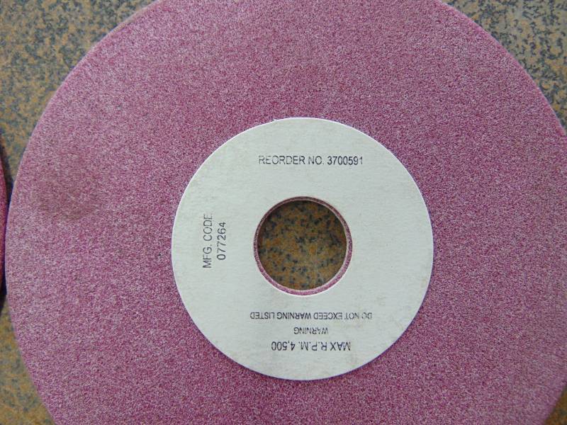 lot 117 image: (2) New Chainsaw Chain Sharpening Wheels