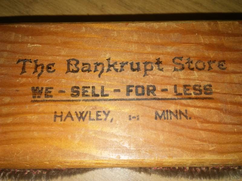 lot 54 image: Vintage Hawley bankrupt store lint brush.