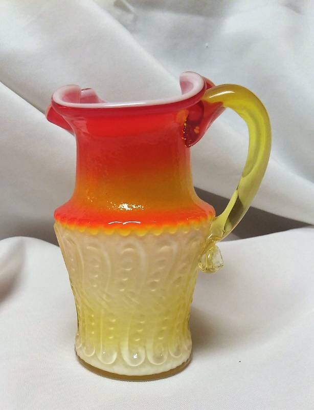 lot 156 image: Czech orange and yellow glass bud vase.