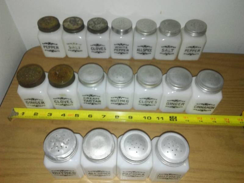 lot 69 image: 18 marbled milk glass spice jars.