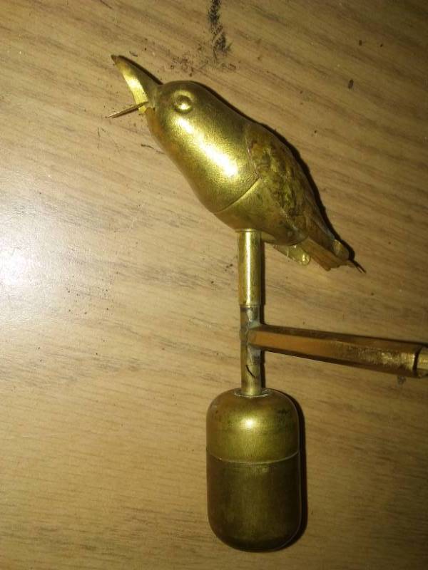 lot 95 image: Vintage brass canary bird whistle.